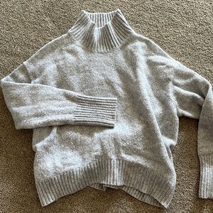 Grey turtleneck sweater